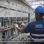 RISAS engineer performing electrical installation and cable connections in industrial facility in Saudi Arabia